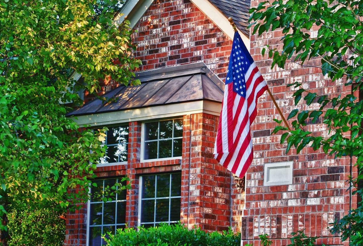 Brick home with an American flag in Hanover County, Virginia
